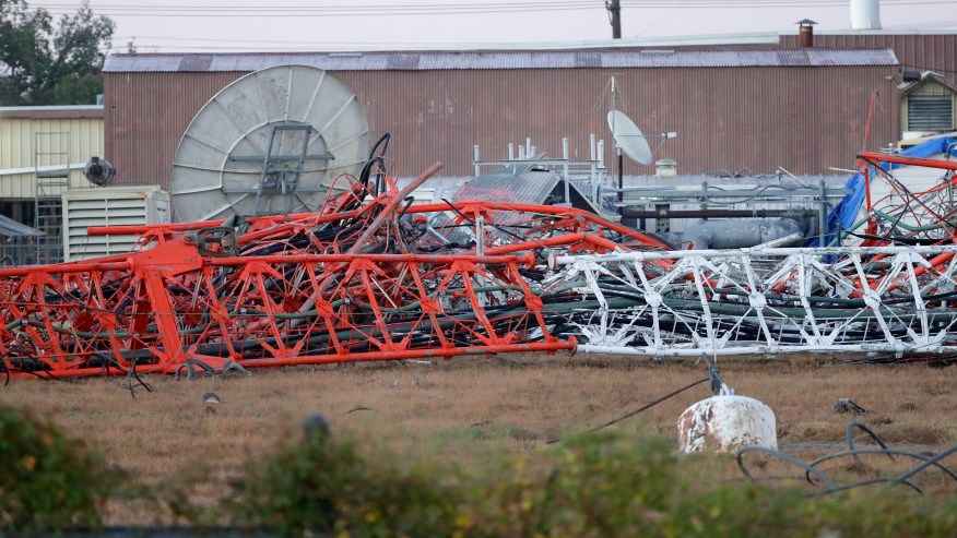 A view from the north side of the collapsed radio tower where a helicopter collided with the structure, killing all aboard Monday, Oct. 21, 2024 in Houston.