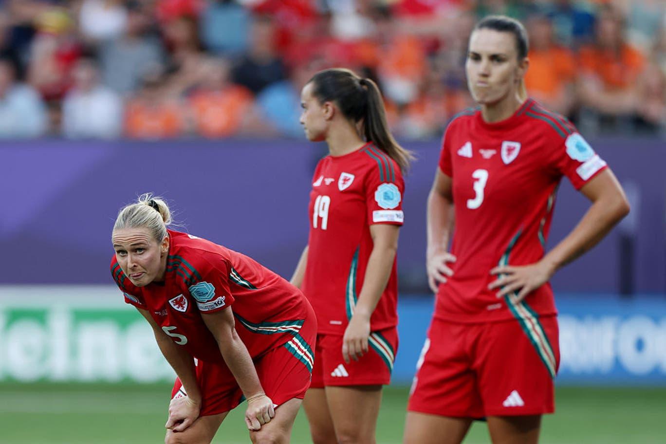 Rhiannon Roberts, Ella Powell and Gemma Evans of Wales look dejected after the teams defeat (Getty Images)